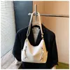 Bolso de nicho de moda, versátil y elegante, nuevo modelo 2026, casual y versátil, sensación de alta gama, bolso de hombro y cruzado versátil, moderno