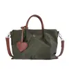 Bolso de hombro patchwork con bloques de color, popular bolso cruzado casual versátil estilo japonés para mujer, bolsa de mano ligera otoño 2026
