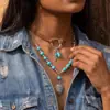 Colar vintage estilo jeans com contas turquesa, retalhos de veludo coreano, contas redondas e pingente de pena - Cruzamento de fronteiras europeu e americano da Amazon