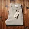Calça casual de negócios fina, masculina, reta, solta, de linho artificial, com textura, para primavera e verão 2023, nova, não amassa, anti-rugas, elástica
