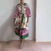 Ropa de mujer transfronteriza europea y americana 2026: Vestido largo holgado estampado de cintura alta, artístico, vintage, moderno, para uso diario y adecuado para el trabajo