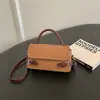 Bolsa pequena quadrada de cor sólida, texturizada, estilo vintage para mulheres, nova coleção outono 2026, bolsa de ombro moderna, adequada para o trabalho e para o dia a dia, bolsa transversal