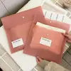 Bolsas de non-woven rosas engrosadas para tiendas de ropa, bolsas de compras para empaque de regalos al por mayor, se pueden imprimir con logo