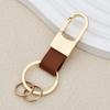 Chaveiro Simples de Couro Personalizado Moda Masculina Pendurado na Cintura Chaveiro de Carro Armazenamento Doméstico Fivela em U Anti-perda Pendurar