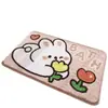 Alfombras absorbentes populares y adorables para baño, alfombras de dibujos animados para uso doméstico, adecuadas para baños, dormitorios y inodoros, con una textura de cachemira sintética
