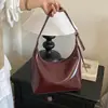 Bolsa de ombro transfronteiriça de alta qualidade para mulheres, nova moda outono 2026, bolsa crossbody de couro macio, bolsa de mão versátil e bolsa de ombro