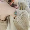 Accesorio de mano estilo chino de loto giratorio para la buena fortuna étnico con mantra de seis caracteres, pulsera y brazalete simples estilo retro
