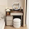 Nova penteadeira cor creme 2026 com banqueta, apresentando armazenamento integrado, adequada para apartamentos pequenos e oferecendo um design de luxo leve e multifuncional