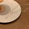 Collar de Perlas con Forma de Corazón de Doble Capa para Mujer verano lujo ligero diseño de alta gama sentido de diseño cadena de clavícula apilada nicho collar de moda coreana