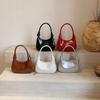 Bolso Media Luna de Piel Patentada de Moda para Mujer 2025 Nueva Llegada Elegante Nicho Versátil Bolso Cruzado Bolso Vintage para Viajero