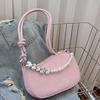 Bolso pequeño con cadena de perlas de alta calidad para mujer, primavera y verano 2024, nuevo bolso bandolera de nicho, bolso de hombro de moda bajo el brazo.