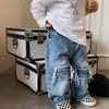 Pantalones vaqueros de primavera y otoño para niños y niñas, pantalones anchos elegantes y modernos de estilo coreano con rotos, deshilachados y parches