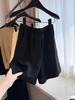Um Par de Shorts Versátil e Fácil de Usar com um Design Emagrecedor de Cintura Alta e Cintura Elástica para Uso Casual