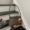 Bolso cruzado estampado versátil y moderno para mujer Otoño/Invierno 2025 Bolso de mano texturizado Bolso de hombro simple y sofisticado para el trabajo