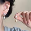 Aretes de Pin de Plata 925 2024 Nuevos Aretes de Metal Estilo Frío de Sentido de Alta Gama Accesorios de Aretes Simples de Verano para Mujer