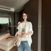 Camiseta blanca de manga corta de algodón puro con diseño único para mujer, nuevo estilo de verano con estampado de té con leche, top de verano juguetón y vibrante