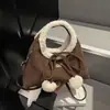Moderna bolsa de peluche para mujer, nueva colección otoño/invierno 2026, bolsa tote retro, bolsa cruzada de peluche de alta calidad y elegante