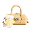 Bolso tipo almohada de cuero suave de alta apariencia con patrón de lichi para mujer, Nuevo bolso de mano Boston de moda 2026, Bolso de hombro cruzado individual para mujer