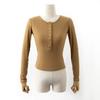 Otoño e Invierno nuevo top de camiseta de manga larga transparente con hebilla para mujer de estilo europeo y americano C77115
