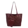 Bolso tote de moda estilo coreano para mujer de este año, nuevo bolso de hombro de lujo ligero con estampado de leopardo otoño 2026, bolso para madre e hijo bajo el brazo