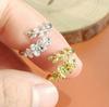 Anillo de Flor Abierta Pequeño Fresco de Moda para Mujer Otoño e Invierno Nuevo Lujo Ligero Sentido de Alta Gama Anillo Ajustable de Ramas y Hojas de Flor