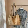 Bolsa de Ombro Tendência Ins Feminina Nova Grande Capacidade Casual Leve Cor Lisa Bolsa Tote Roupas de Trabalho Bolsa de Mão Versátil