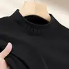Venta al por mayor Comercio exterior Camiseta de manga larga de color liso para hombres de mediana edad Otoño e Invierno Top versátil de cuello alto medio Capa base térmica