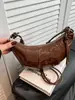 Bolso de nicho transfronterizo para mujer 2026, bolso versátil de hombro y cruzado, bolso de cuerno moderno y súper popular, bolso nuevo y moderno ligero