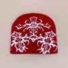 Nuevo patrón gorro de punto estilo europeo y americano de nicho para hombres y mujeres cálido personalidad hip-hop rap gorro pullover para exteriores venta al por mayor