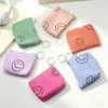 Bolsa para monedas de pana con cara sonriente estilo Ins, llavero tipo bolsa de macarrón, bolsa para guardar audífonos y monedas para niñas