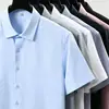 Camisa de manga corta para hombre, color liso, sin arrugas, a prueba de salpicaduras, resistente al aceite, antiarrugas, adecuada para trabajo de campo y desplazamientos, con cuello de solapa