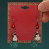 Pendientes de aleación con diseño de alce y copo de nieve, de estilo europeo y americano, con dibujos creativos, para Navidad.