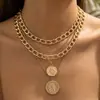 Collar con colgante de retrato exagerado de capas transfronterizo de Amazon, exquisito, minimalista, moderno y con un toque de alta gama, con un colgante redondo y una cadena para la clavícula