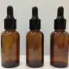 Botella de vidrio marrón de fábrica para aceite esencial botella de embalaje de aceite esencial cosmético 30ml botella de depuración para trasvase al por menor en stock