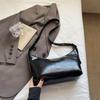 Bolso de Axila de Moda de Alta Gama de Comercio Exterior para Mujer 2025 Nuevo Bolso de Hombro para Viajar Bolso Cruzado Casual Simple Tipo Dumpling