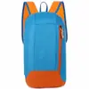 Mochila colorida em estoque, à prova d'água, leve, de grande capacidade para viagens ao ar livre, mochila escolar estudantil unissex, entrega direta no atacado