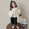 Conjunto de camisa floral con orejas de conejo para niña estilo coreano, nuevo modelo primavera y otoño 2026, elegante conjunto de dos piezas para niñas pequeñas