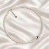 Collar de perlas de doble capa para mujer, diseño de nicho de Corea del Sur, personalidad retro francesa, cadena de cuello de temperamento simple que combina con todo, cadena de clavícula