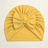 Otoño e invierno europeo y americano nuevo terciopelo alemán para niños gorro suave con lazo para bebé cálido gorro de punto liso sombrero para bebé