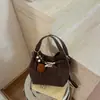Bolso Cubo Sencillo Transfronterizo para Mujer Nuevo Estilo 2026 Moda Versátil Nicho Bolso de Hombro Único Cruzado Bolso de Mano Elegante para el Trabajo