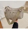 Bolso cuadrado pequeño informal de moda estilo coreano, con múltiples bolsillos y gran capacidad, versátil para viajes y compras, se puede llevar al hombro o cruzado.