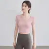 Hermoso Top de Yoga Espalda Descubierta para Mujer 2026 Nuevo Transpirable Ropa de Fitness Traje Deportivo de Pilates Manga Corta con Almohadillas en el Pecho