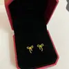Pendientes de Flor con Lazo Dorados de Alto Valor Estilo Occidental Nicho Moda Simple Combinan con Todo Pendientes de Gama Alta
