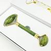 Suministro directo de fábrica Jade Rodillo masajeador facial Blanco verde Jia Cui doble cabeza recipiente de belleza Xiuyu caja de regalo