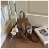 Mochila Feminina Casual Retrô para o Dia a Dia 2025 Outono/Inverno Novo Estilo Mochila Escolar Pequena Exquisita para Passeios Viagem Bolsa Transversal