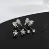 Aguja de plata S925 juego de tres pares en una tarjeta aretes de botón diseño de nicho femenino sentido del diseño aretes pequeños de lazo aretes para dormir sin quitar