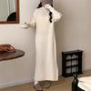Vestido Tricotado Versátil de Gola Alta Dobrada Cor Pura Coreano para Mulheres Outono e Inverno Novo Solto para Usar por Baixo Casaco Suéter Saia Longa