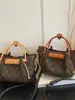 Bolso Cruzado de Textura de Alta Calidad Guti Kou 2026 Nuevo Estilo Moda Versátil Bolso de Axila Bolso de Mimbre de Nicho
