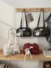 Bolso de hombro y axila de lunares de moda transfronteriza de nicho para mujer, nuevo bolso de mano para commuting 2026, bolso Boston, bolso almohada