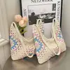 Bolso Tejido Calado Estilo Artístico de Primavera Transfronterizo para Mujer 2026 Modelo Nuevo Bolsa de Playa para Vacaciones y Viajes Bolso de Hombro de Gran Capacidad